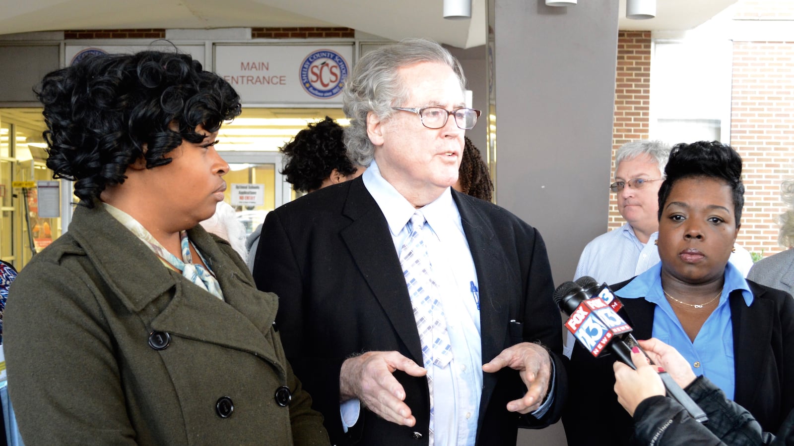 From left: Shelby County Schools Board of Education members Stephanie Love and Mike Kernell speak at an anti-voucher rally that was attended by supporters of the pro-voucher group Black Alliance for Educational Options.