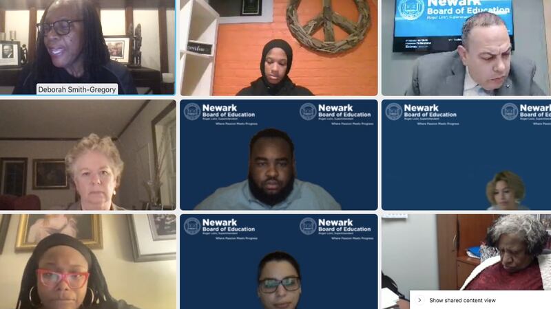 Newark Board of Education members and Superintendent Roger Leon listen to a member of the public speak during a virtual meeting on Nov. 23, 2021.