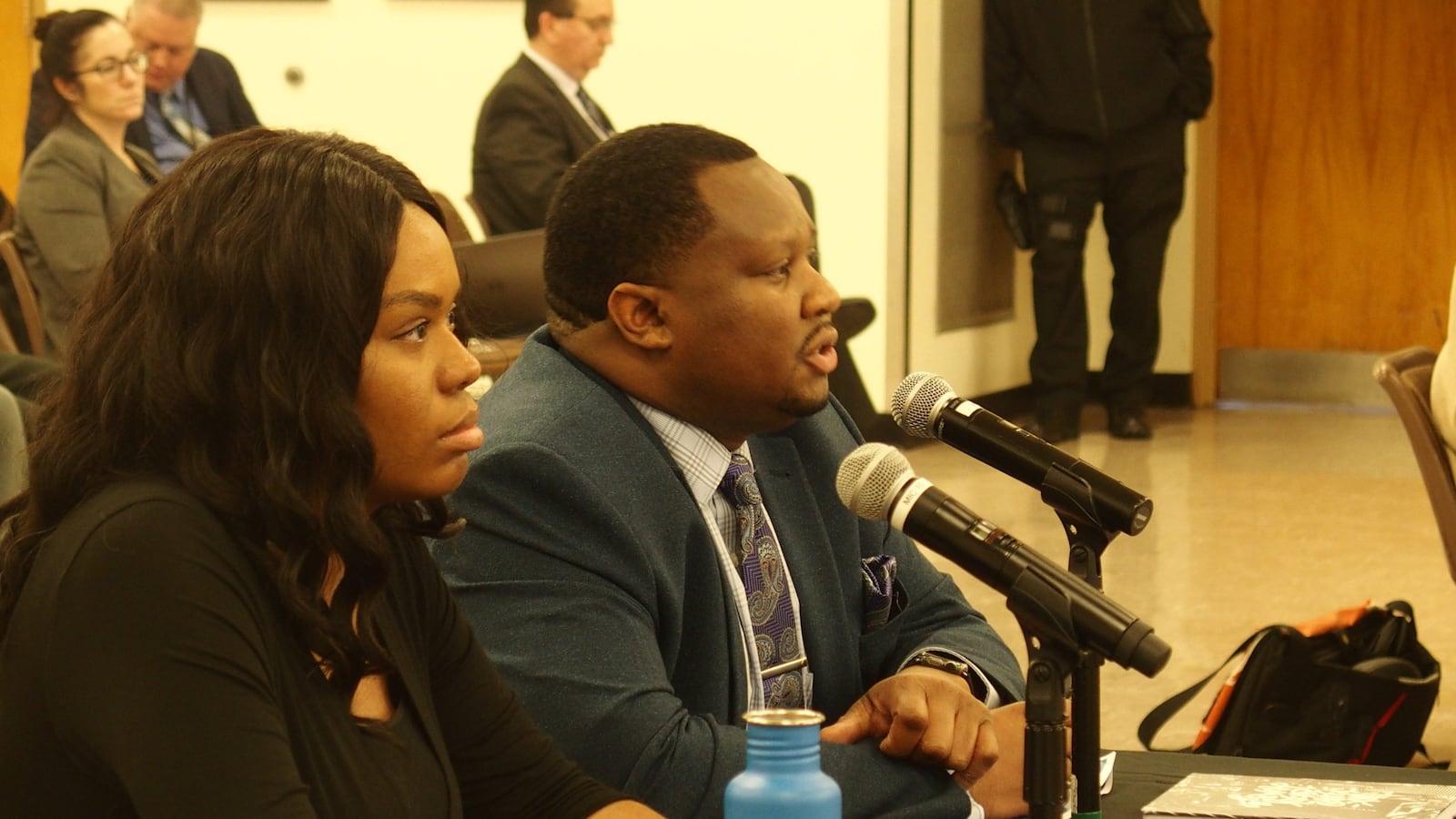 Tyree Daniels, board chair for Memphis College Preparatory, right, speaks to Shelby County Schools board members during a hearing on the school's contract renewal.