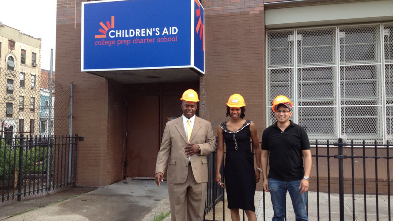 Richard Buery, left, on a 2012 tour of Children's Aid Society's charter school building before opening.