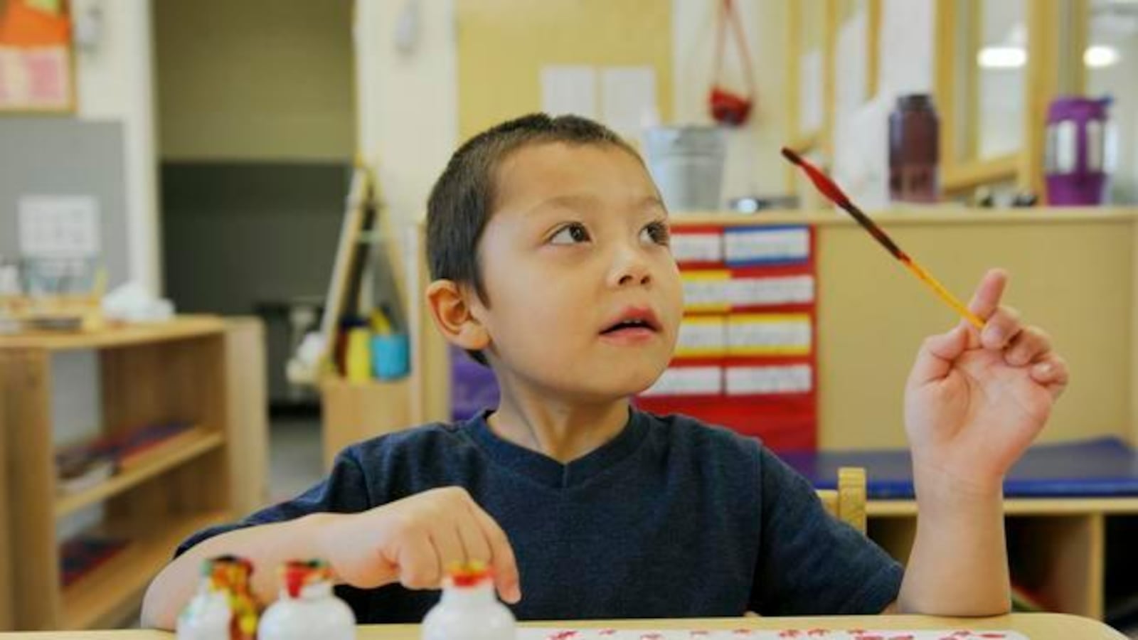 Josiah Berg, 4, paints a picture at Mile High Montessori, one of more than 250 Denver preschools that are part of the Denver Preschool Program.