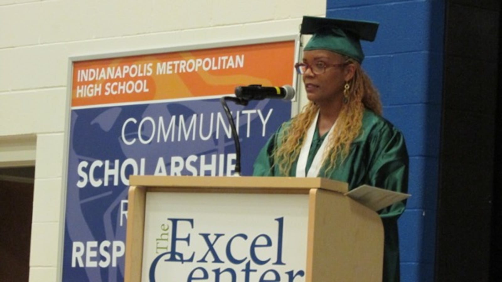 Tammy Burrus speaks to her fellow graduates of the Excel Center adult charter high school.