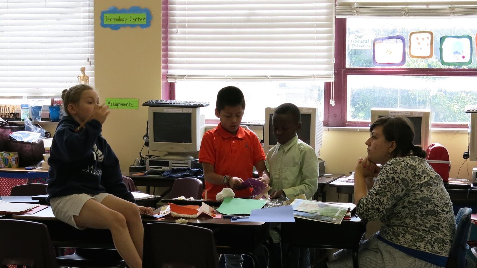 A group of Jubilee School students work on a craft during a summer reading program at La Salle School, one of the Memphis schools expected to accept tuition vouchers if the state legislature approves a program.