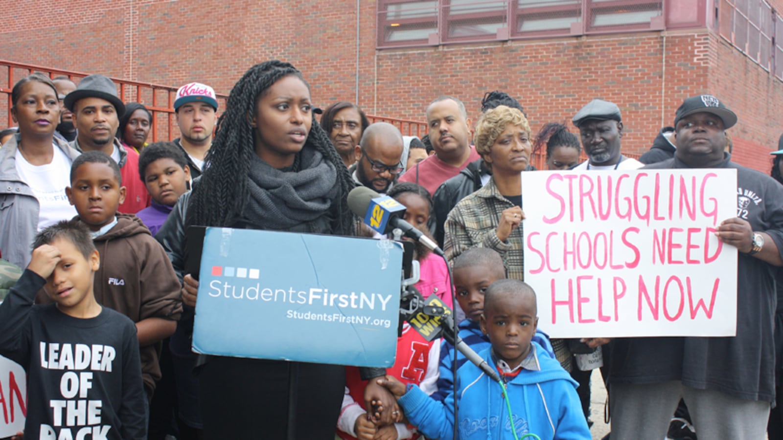 Tenicka Boyd, an organizer for StudentsFirstNY, spoke at a rally outside Boys and Girls High School in Brooklyn.