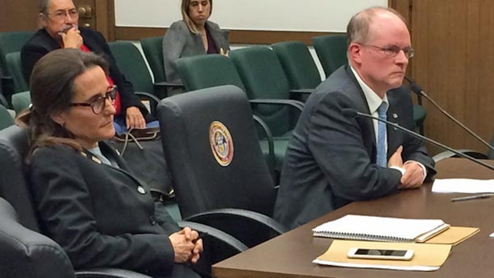 Rep. Jeni Arndt (left) and teacher Russ Brown listened to committee questions during the hearing on Arndt’s bill.