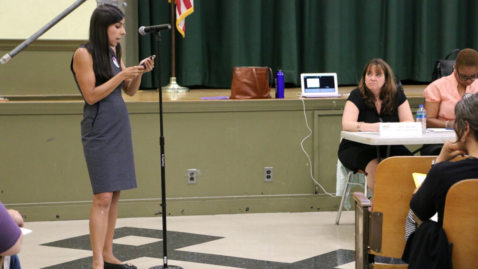 A P.S. 452 parent spoke out Monday evening against the city's plan to move and rezone the school.