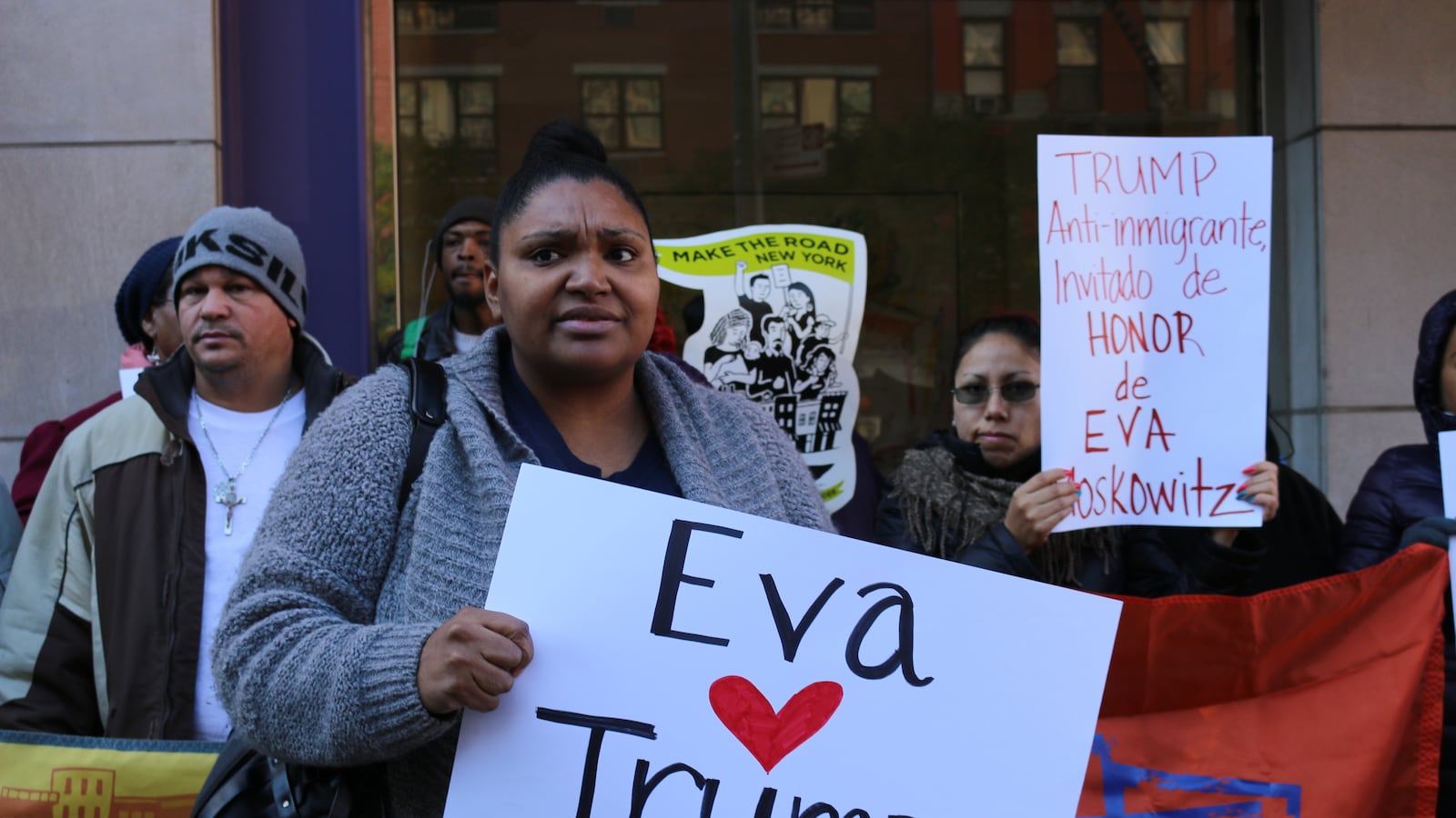Angel Martinez, a member of the Parent Action Committee, protests in front of Eva Moskowitz's home in November.