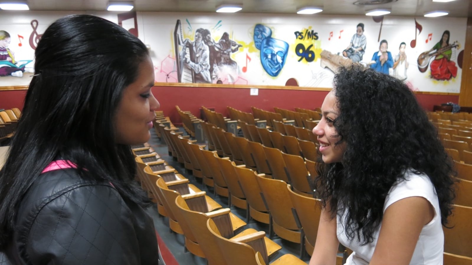 Dolores Gonzalez, left, with her eighth grade daughter, Sanaya, in the P.S./M.S. 96 auditorium in East Harlem