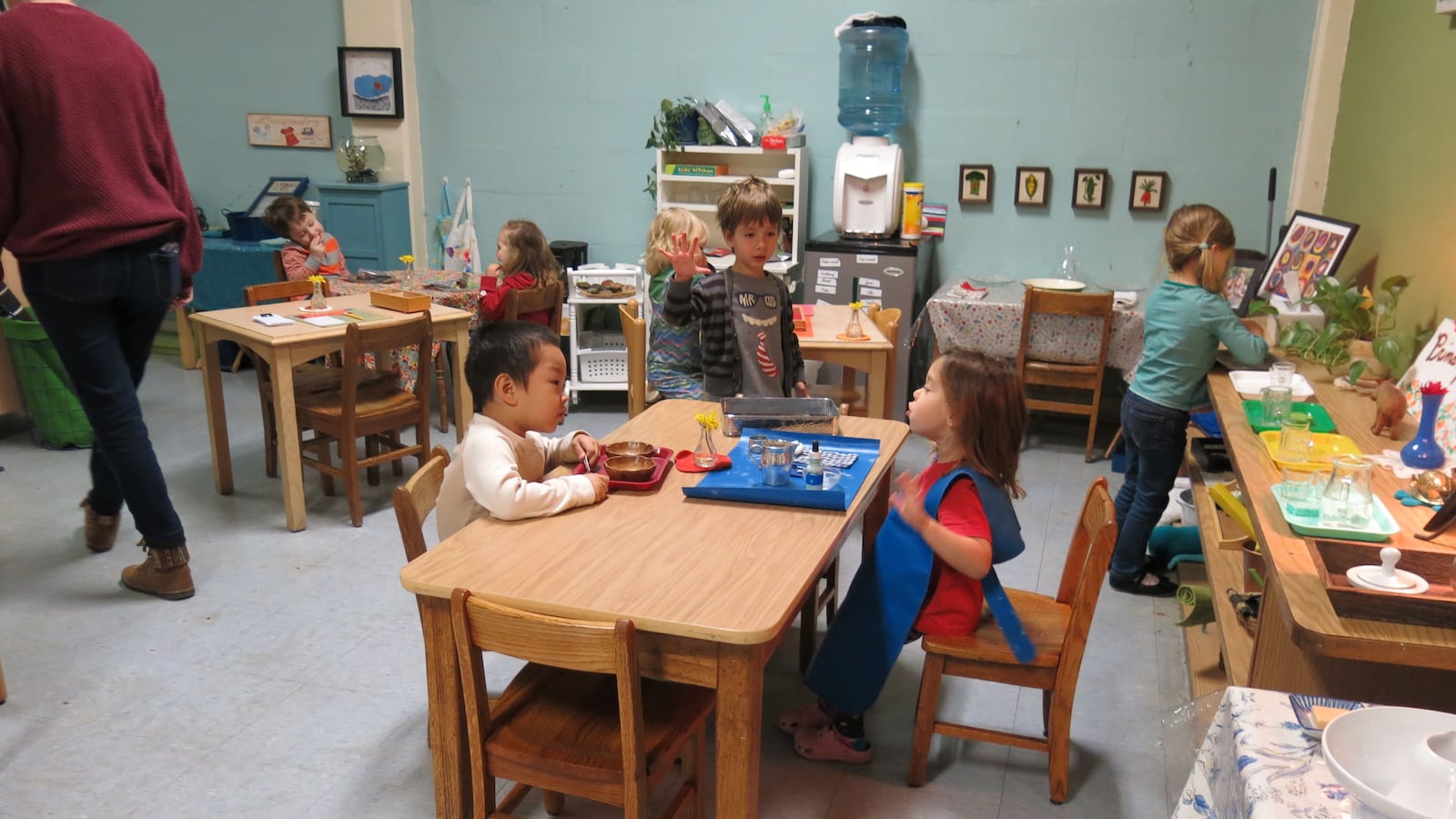 Students at Evergreen Montessori School work on a lesson together.