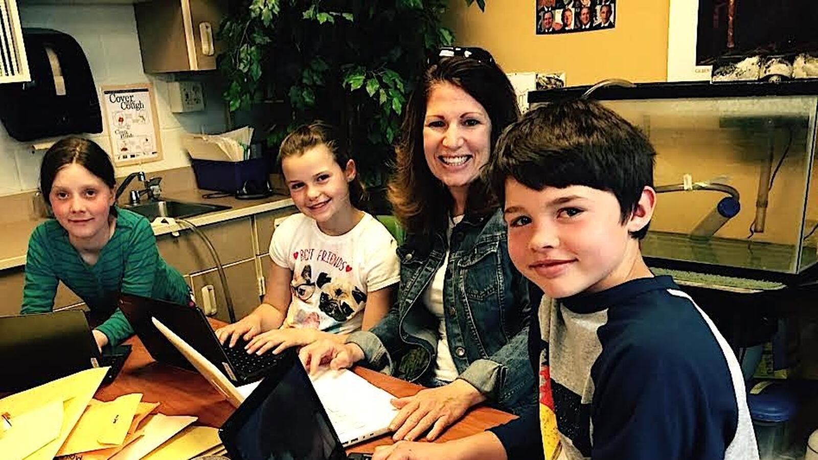 Cynthia Rimmer, a fourth grade teacher at Fraser Valley Elementary School in the East Grand School District, works with students.