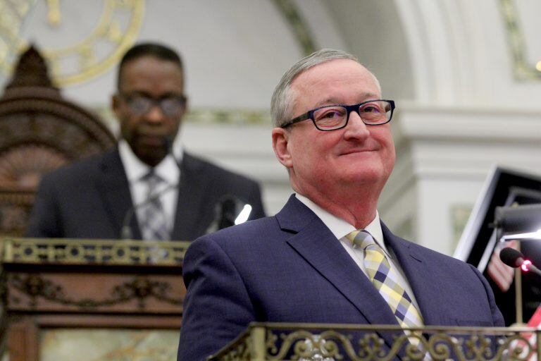 Mayor Jim Kenney standing at a podium.