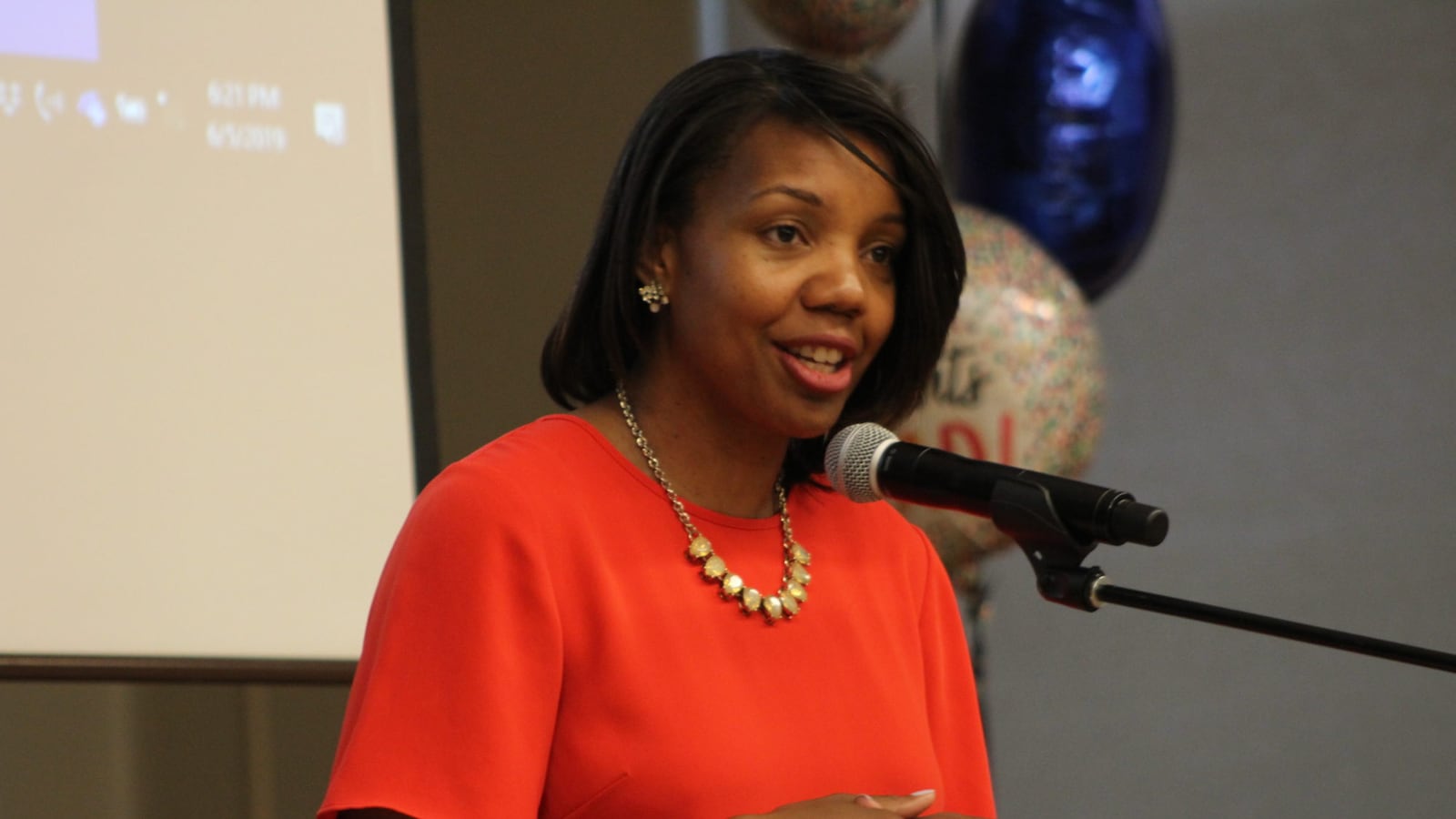 IPS Interim Superintendent Aleesia Johnson delivers a keynote speech at the graduation ceremony for her district's fifth Stand University for Parents class.