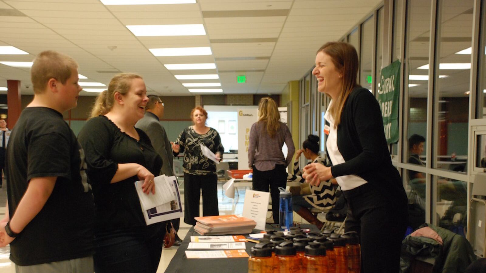 Cole McAndrew, left, and his mother Katherine meet with Jennifer Floersch of the Colorado Connections Academy.
