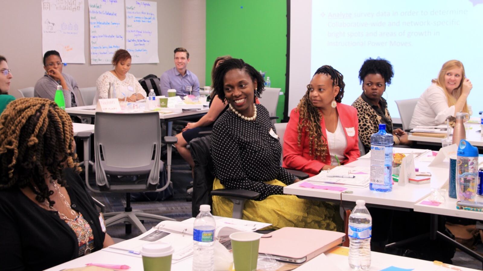 Monique Cincore (center) is one of 23 educators participating in a new collaborative between local charter schools and KIPP.