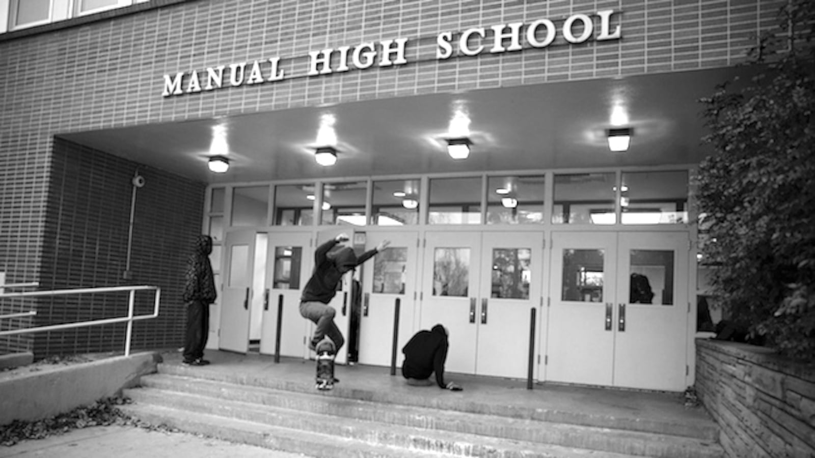 A Manual student skateboards across an entrance in December. Students are aware of how far behind they are, but constant 'nagging' has left many students dis-interested in learning.