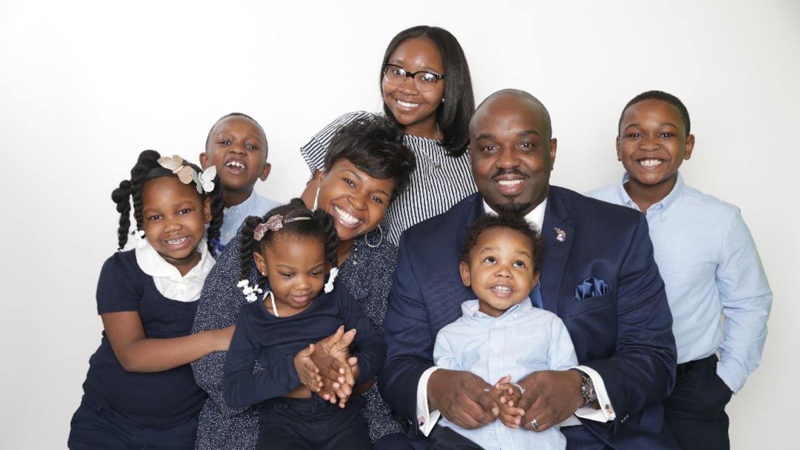 Nicole and Shaun Maloy want their son, Alexander, 3, (sitting on his dad's lap) to have the same access to education as his five siblings.