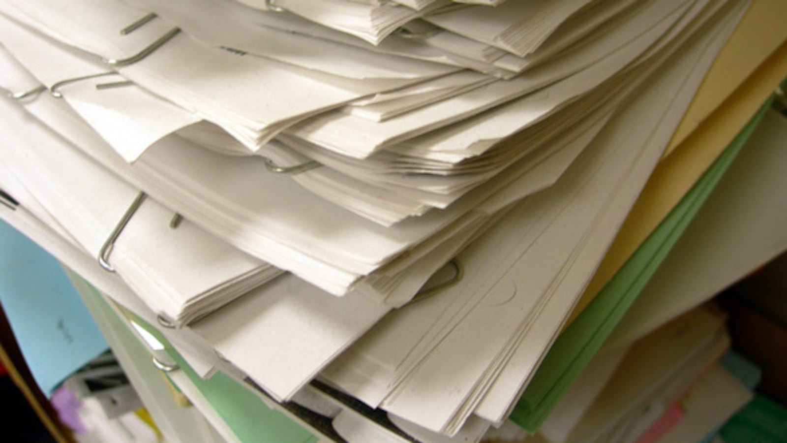 Bulging stack of papers