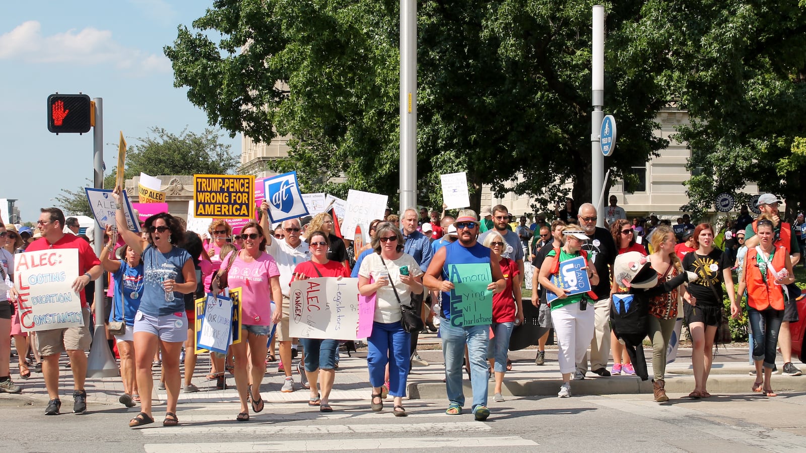 Protestors gathered in front of the Indiana State House before marching through downtown Indianapolis to protest ALEC's annual meeting taking place at the JW Marriott downtown last year.