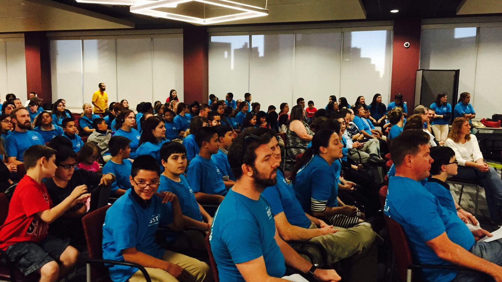 Supporters of charter school network DSST crowd Monday's public hearing on the fate of district buildings in southwest Denver (provided by DSST).