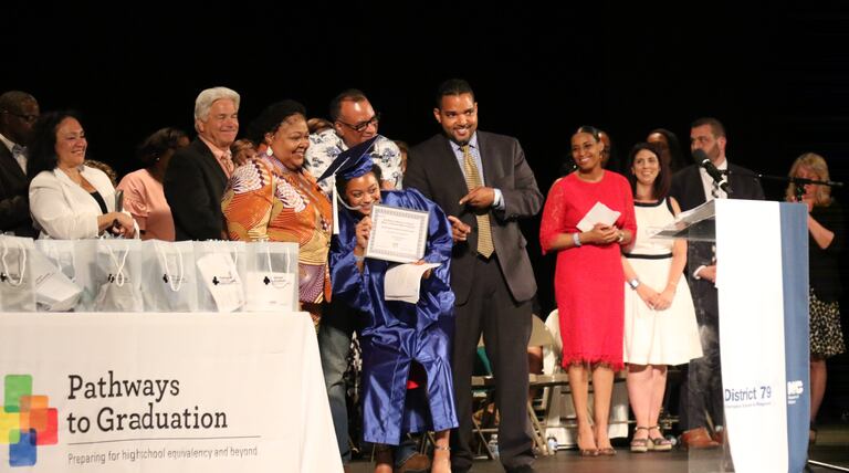 ‘They’re my second family.’ Largest Pathways to Graduation class earn their diplomas