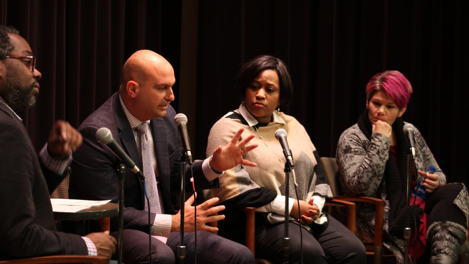 Detroit Superintendent Nikolai Vitti, second from left, says a tweak to school funding policy in Michigan would alleviate some of the effects of high student mobility. Looking on from left are moderator Stephen Henderson of WDET, Darienne Driver, CEO of United Way of Southeastern Michigan, and Maria Montoya, who works in the charter school office of Grand Valley State University.