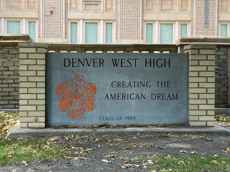 Sign that says, "Denver West High Creating the American Dream."