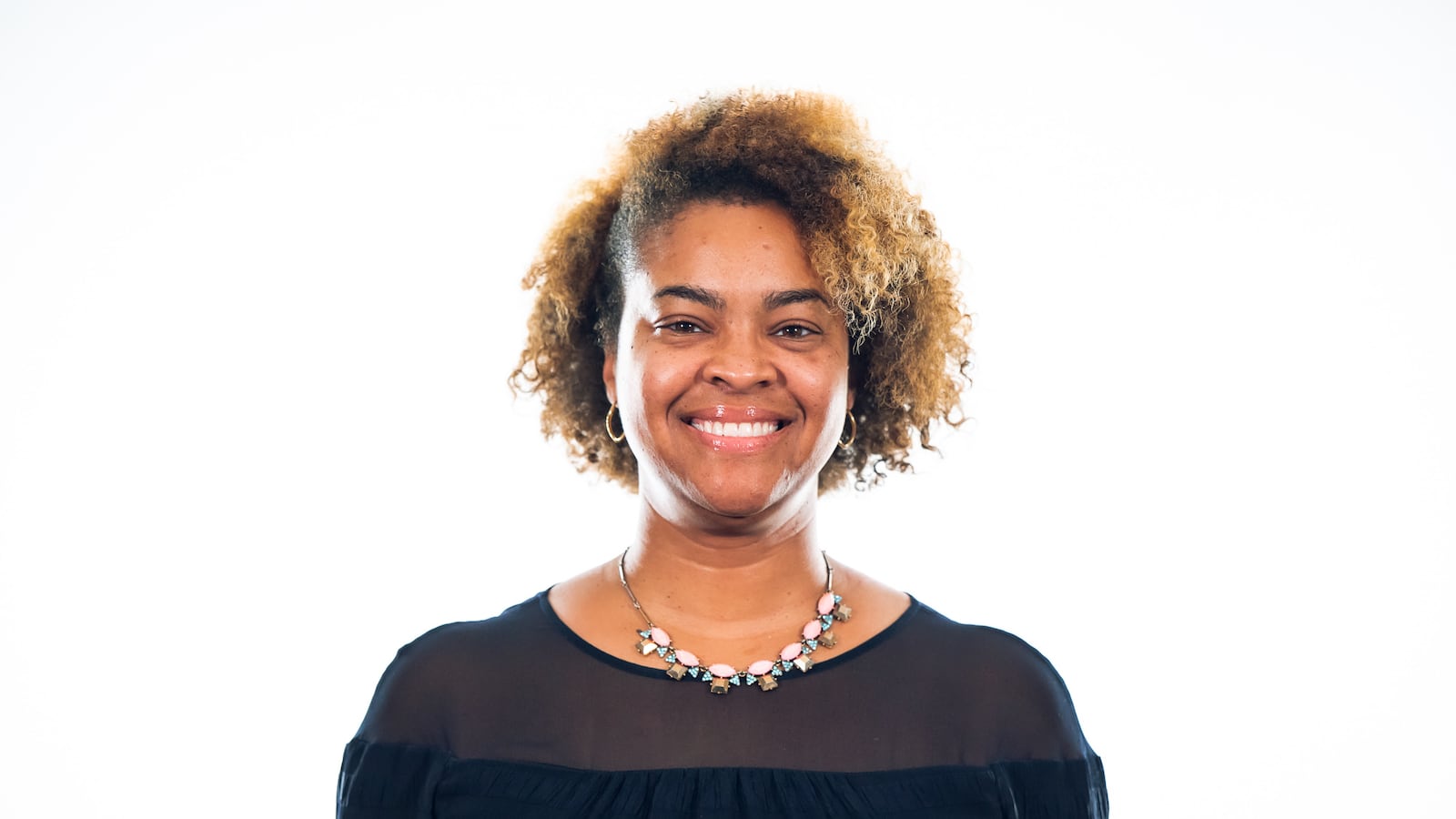 Carla Jones, an elementary school teacher on Chicago's South Side, is balancing remote teaching and facilitating her young daughters' at-home learning.