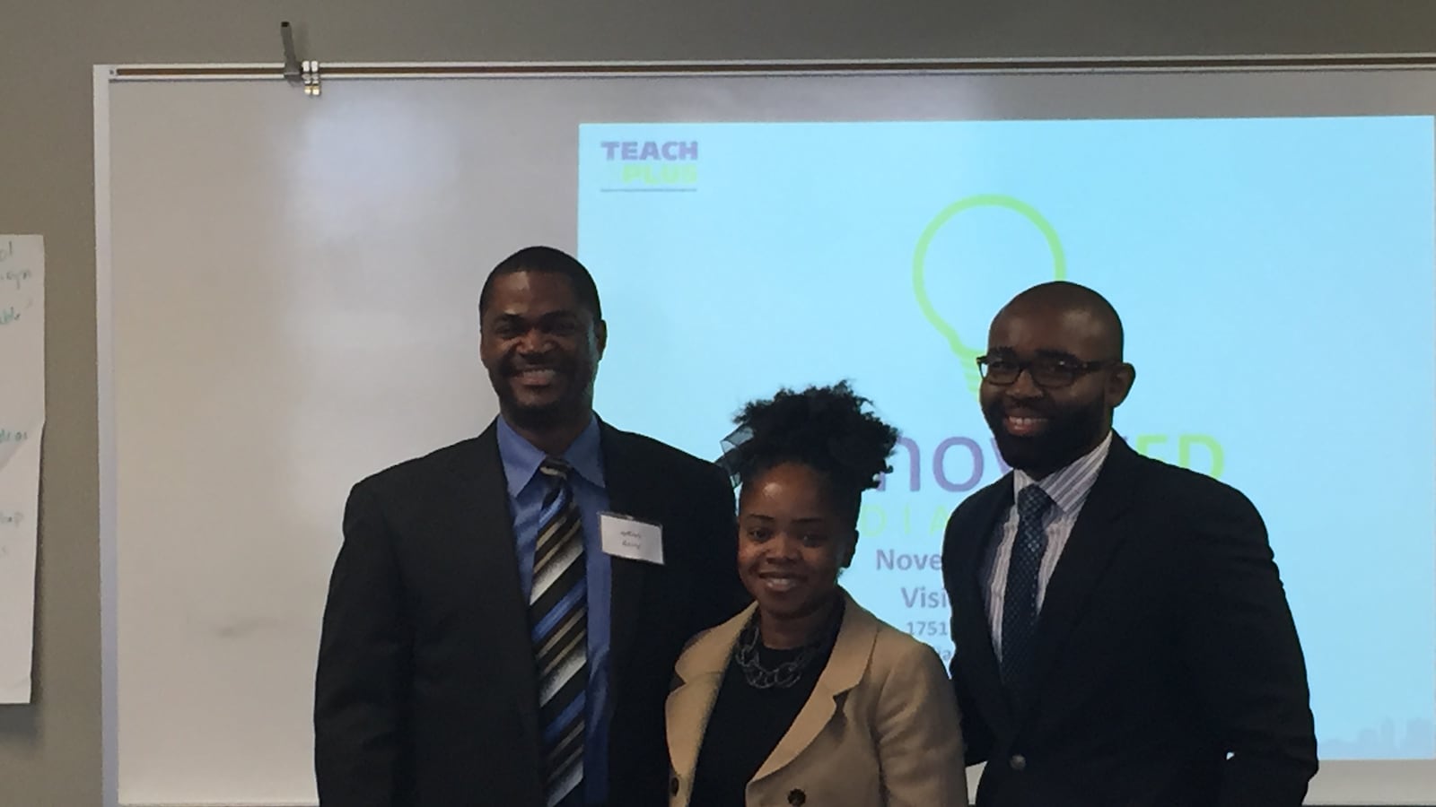 Jeffrey Berry, Tiffany Thomas and Darius Sawyers receive applause after being named as winners at Teach Plus' InnovatEd conference.