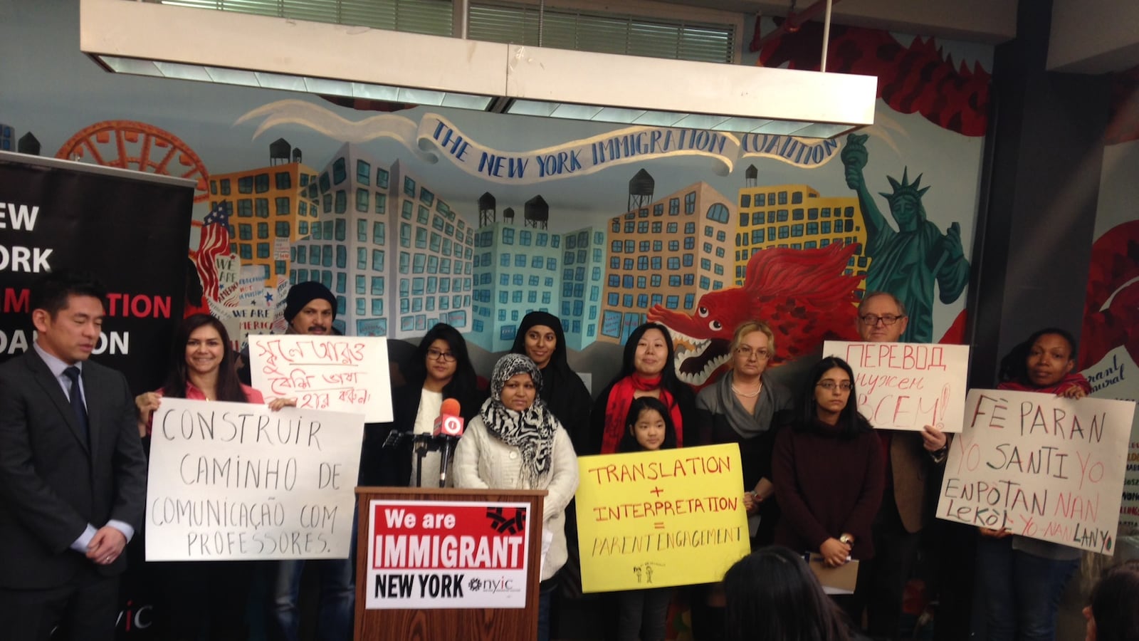 Parents and immigration advocates gather at the headquarters of New York Immigration Coalition to ask the Department of Education to improve access for parents with limited English proficiency.