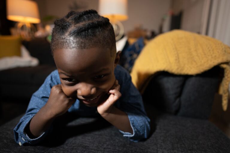 Jett Hawkins poses for a portrait, donning his hair in braids, in his family’s Douglas home in March.