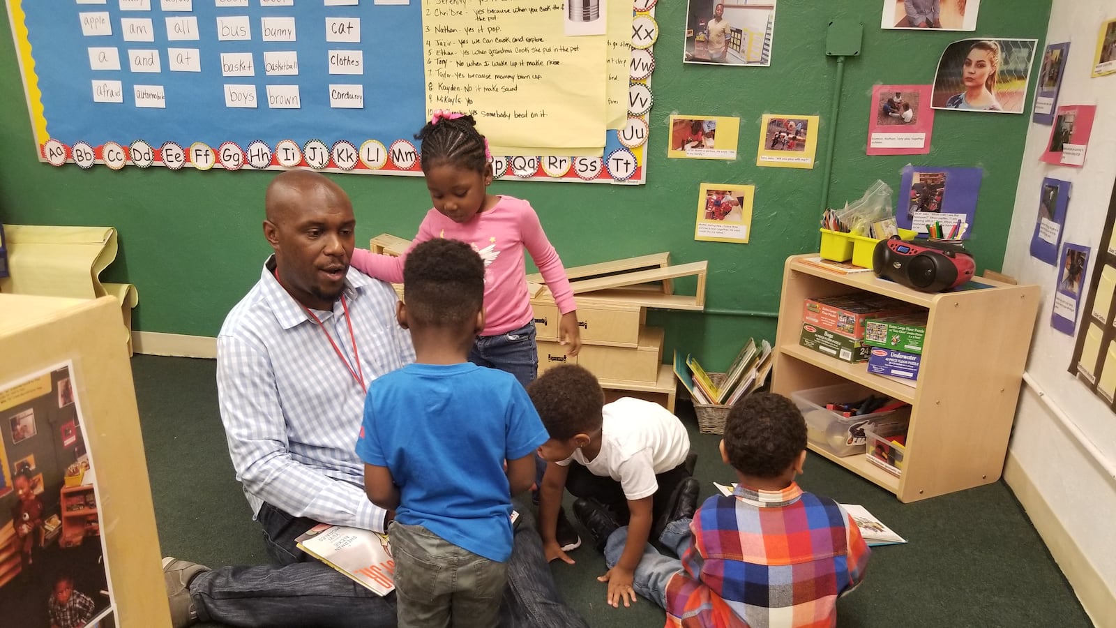 Lee Tate is a master's level teacher who is popular among students at a Chicago Child Care Society in Hyde Park.