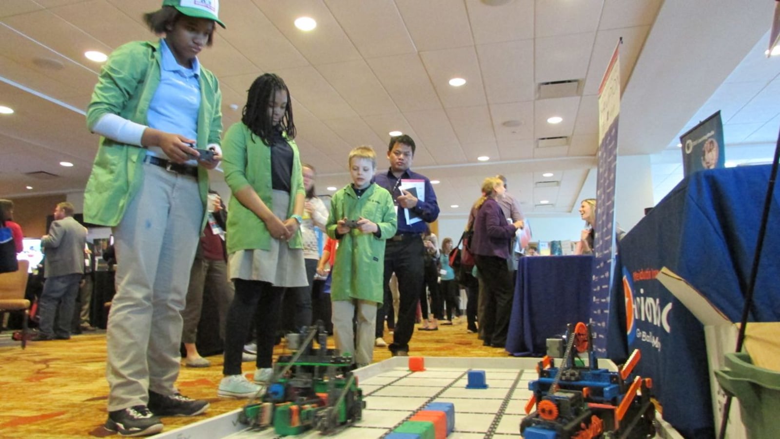 Students from Paramount School of Excellence's robotics team show off their skills at the Indiana Afterschool Network's Summit on Out of School Learning at the JW Marriott hotel in Indianapolis.