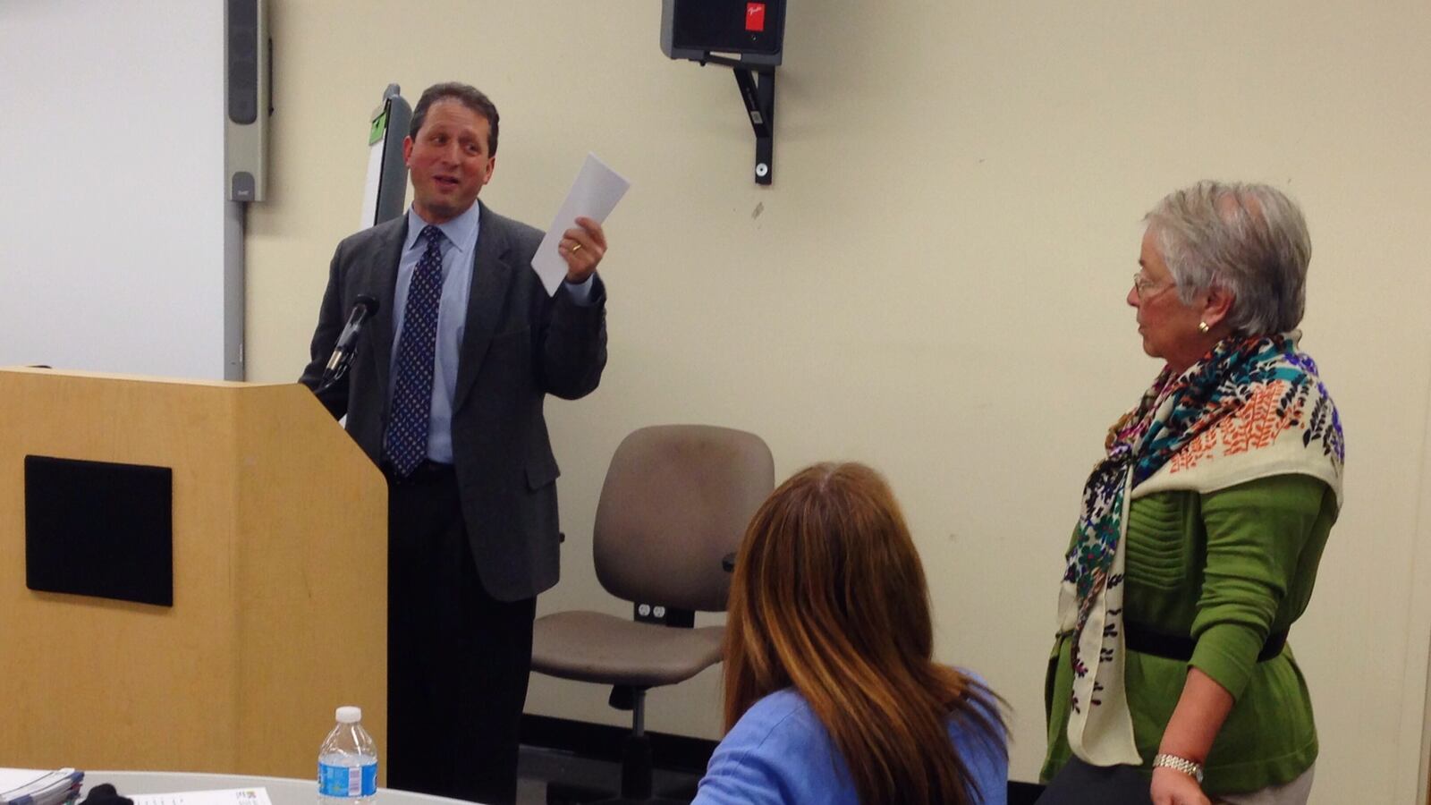 City Councilman Brad Lander, left, talking about Chancellor Carmen Fariña to a group of parent leaders in 2014.