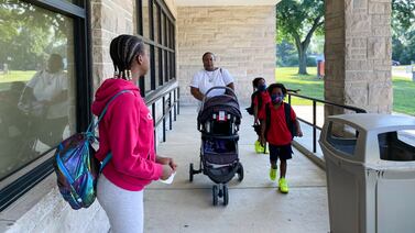 Thousands of masked Indianapolis Public School students head back to school