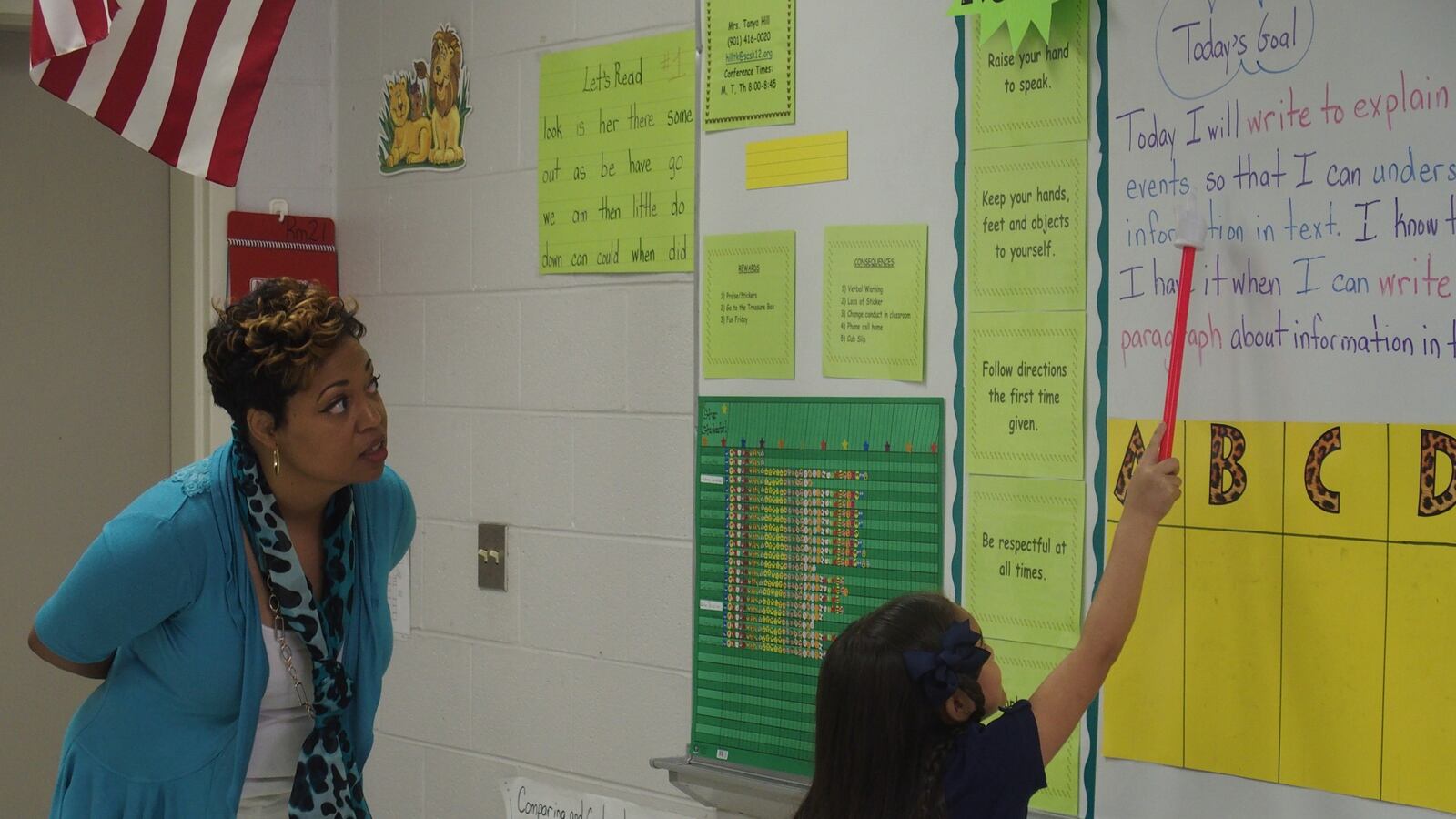 Memphis teacher Tanya Hill encourages a student at Kate Bond Elementary School.