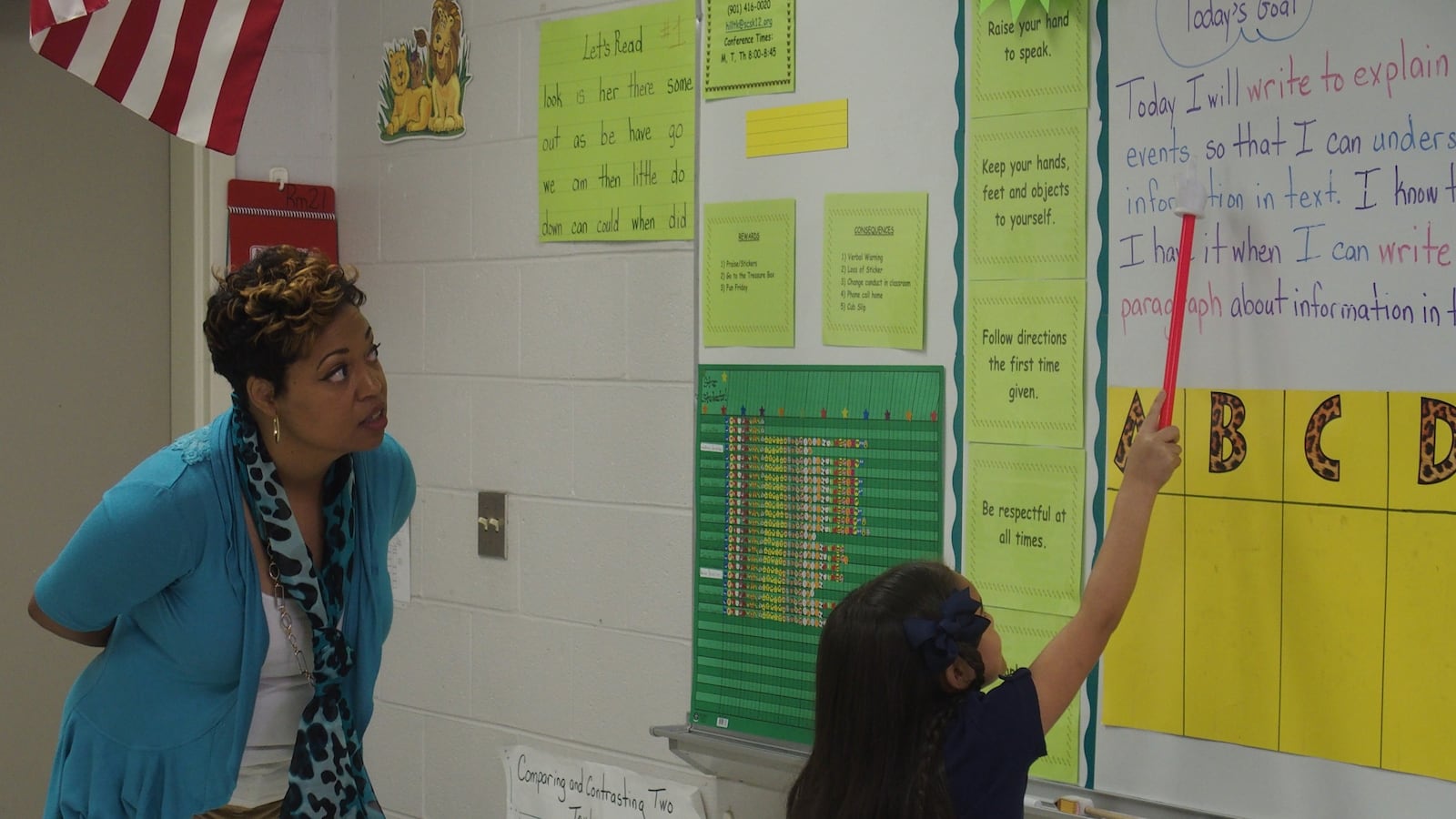 Memphis teacher Tanya Hill encourages a student at Kate Bond Elementary School.