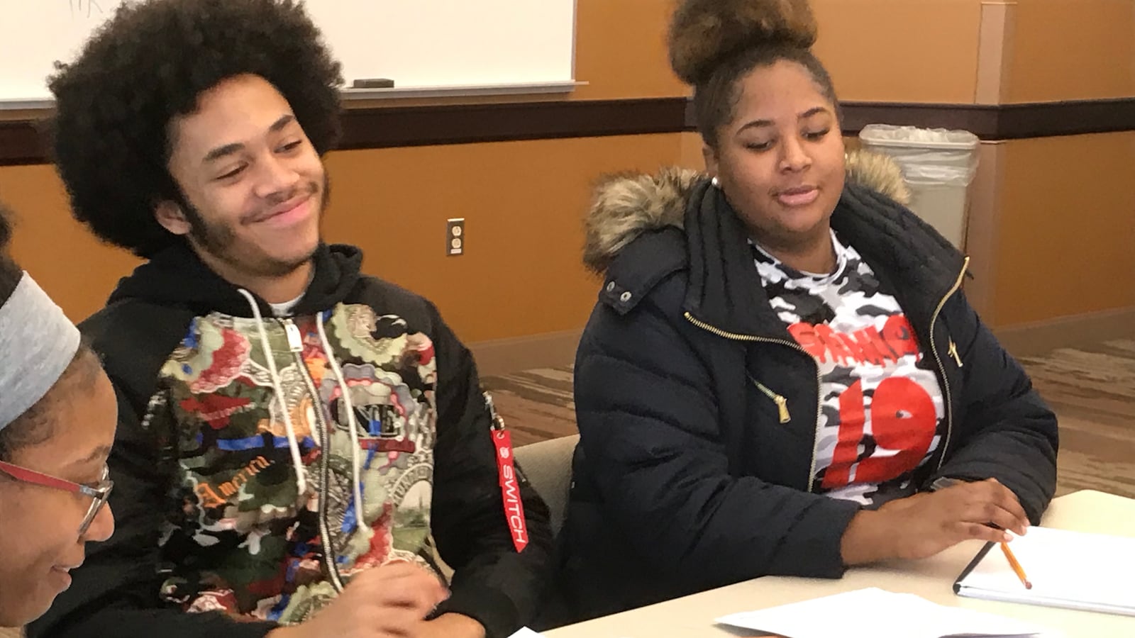 Myles Reed, a senior at Henry Ford Academy: School for Creative Studies, left, hopes to improve his SAT score so he can earn free college tuition to a four-year university.