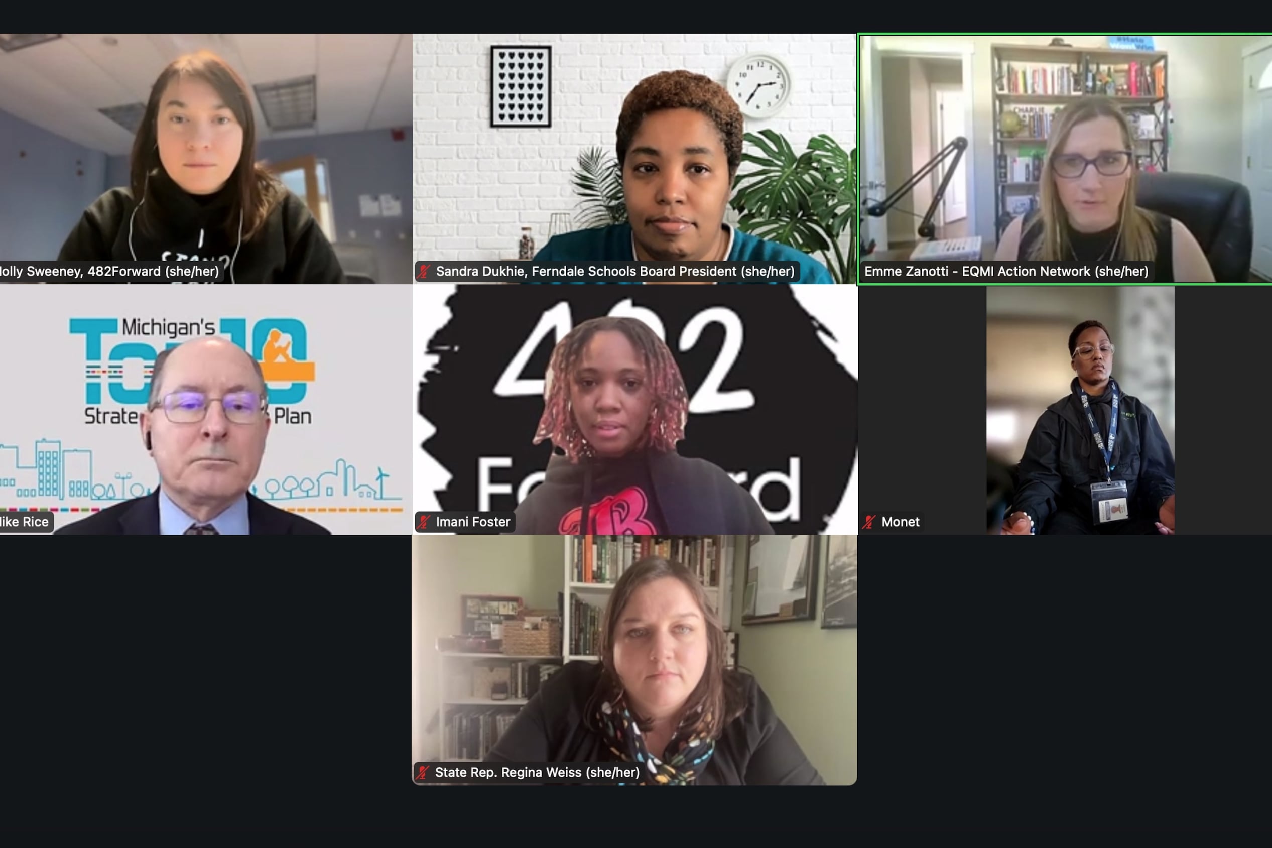 Seven people are seen in squares on a Zoom video call.