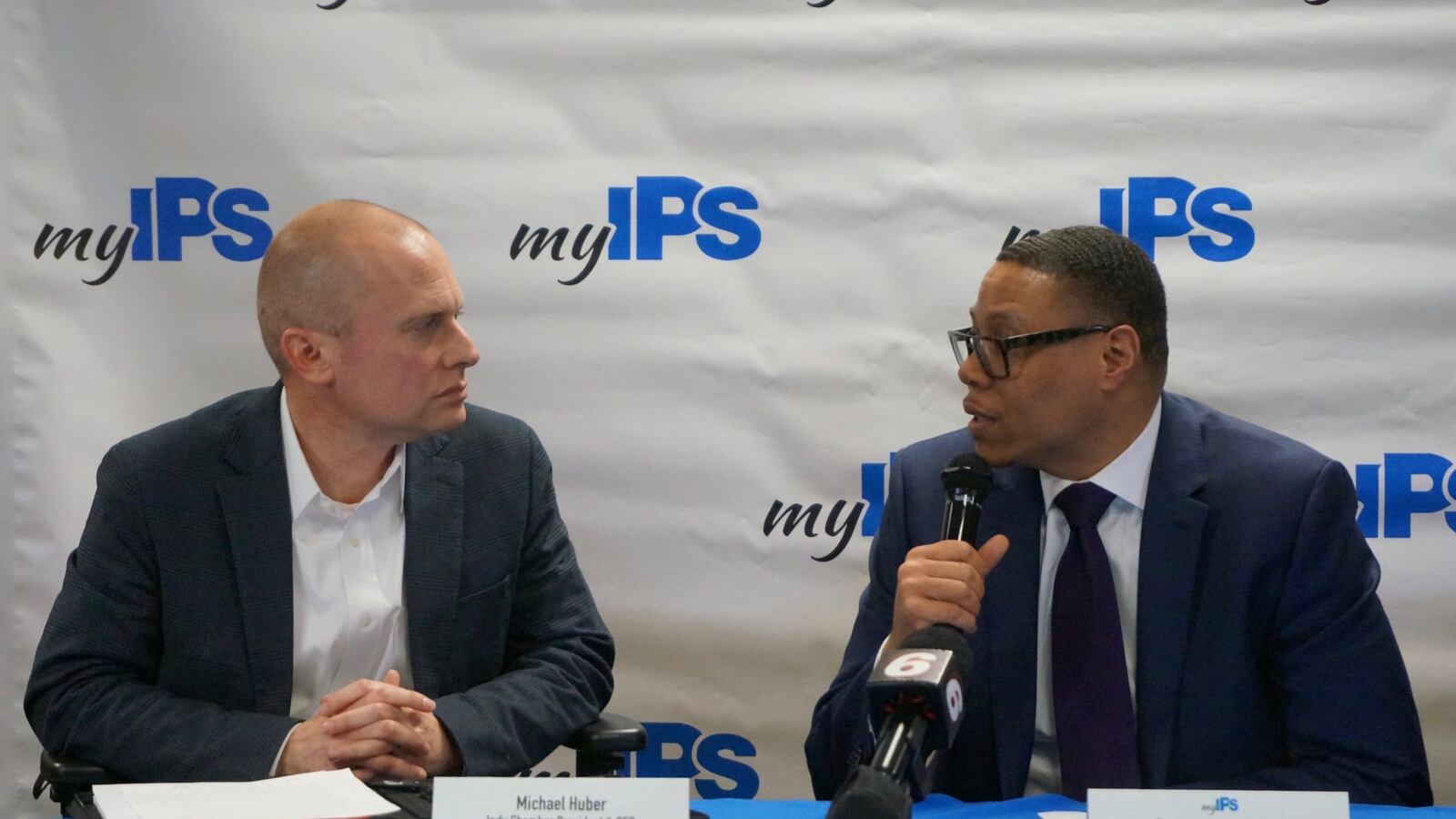 Michael Huber, left, and Lewis Ferebee at a March press conference.