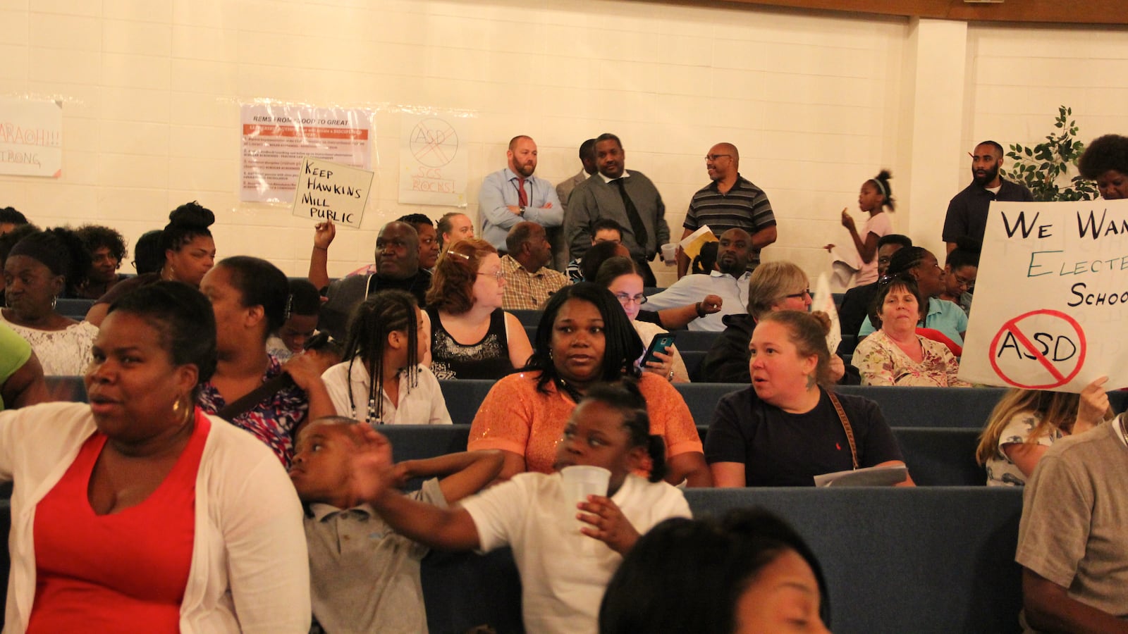 Parents and community members listen to discussion Tuesday evening about the future of Raleigh Egypt Middle and Hawkins Mill Elementary schools in Memphis.