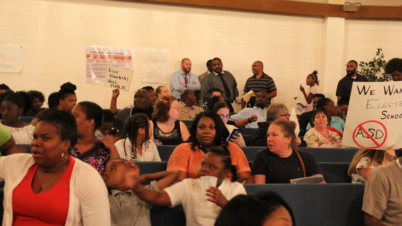 Parents and community members listen to discussion Tuesday evening about the future of Raleigh Egypt Middle and Hawkins Mill Elementary schools in Memphis.