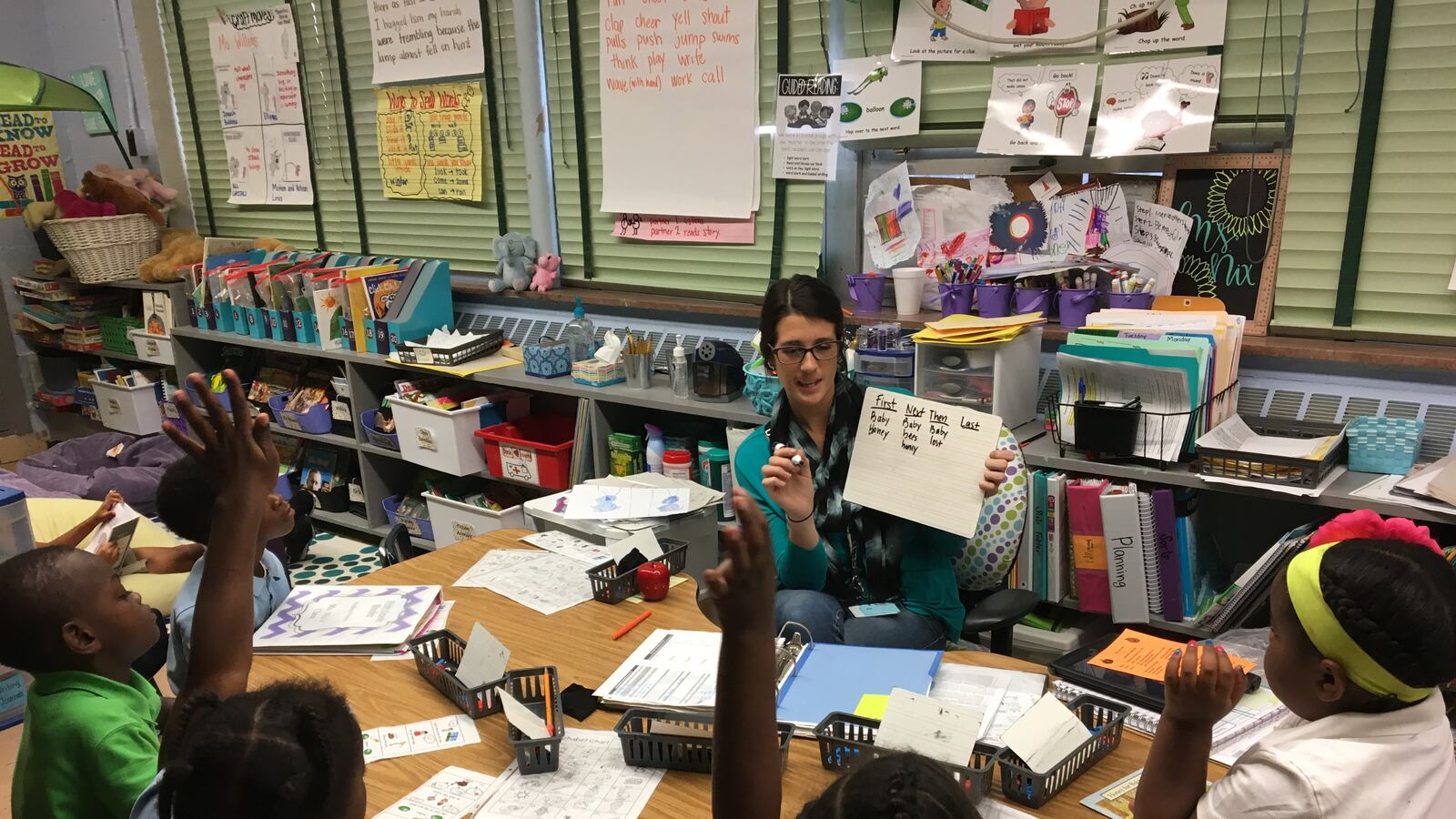 A teacher works with students at a Chattanooga elementary school.
