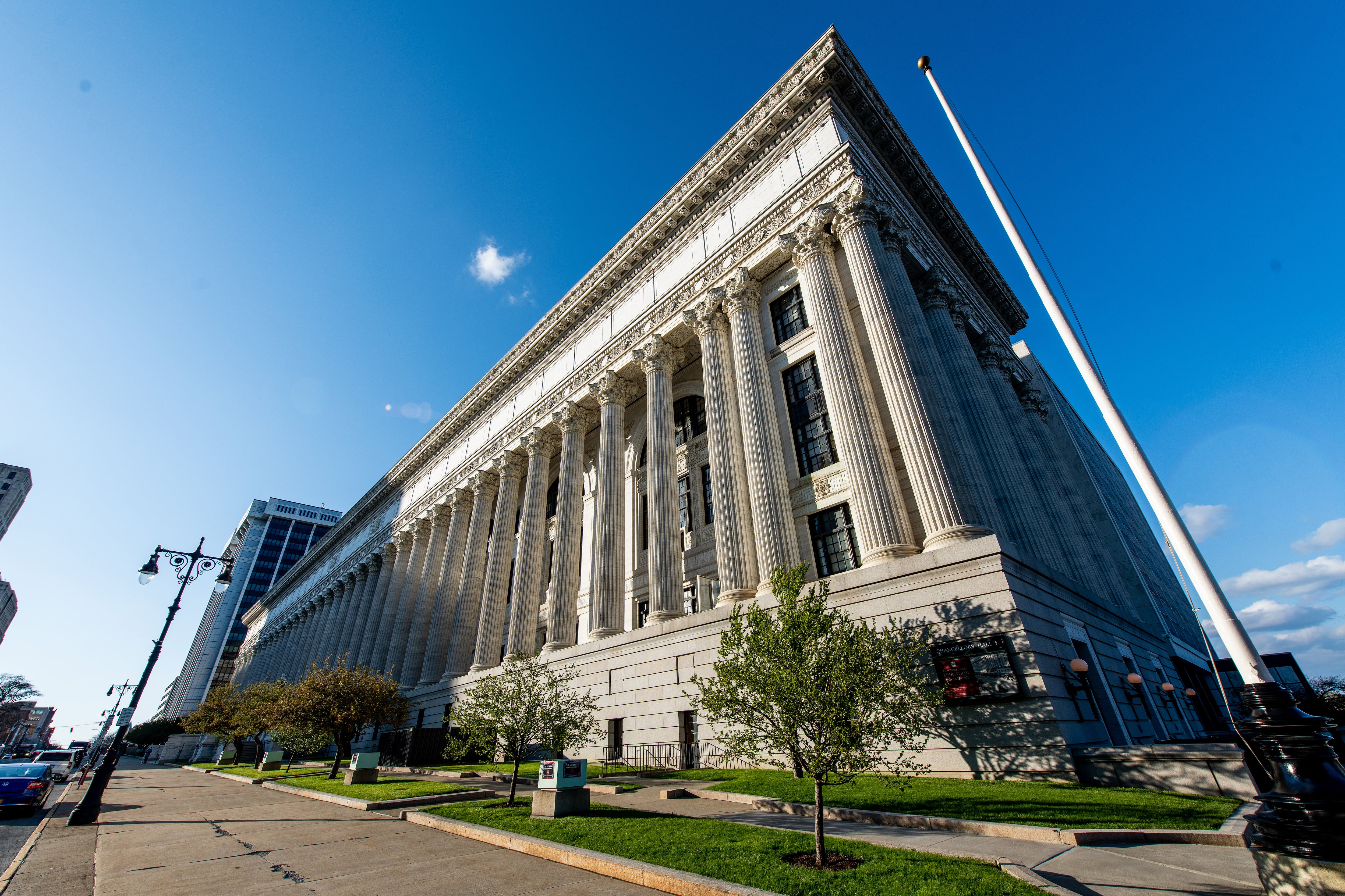 An official-looking white building with columns.