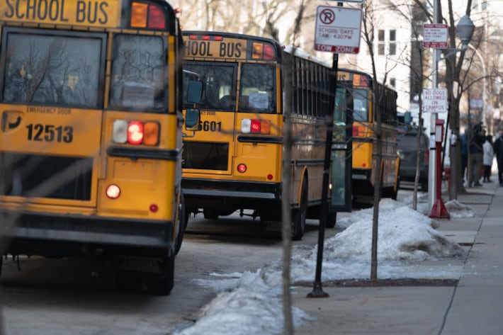 School buses make the rounds in Chicago in March as elementary schools reopen.