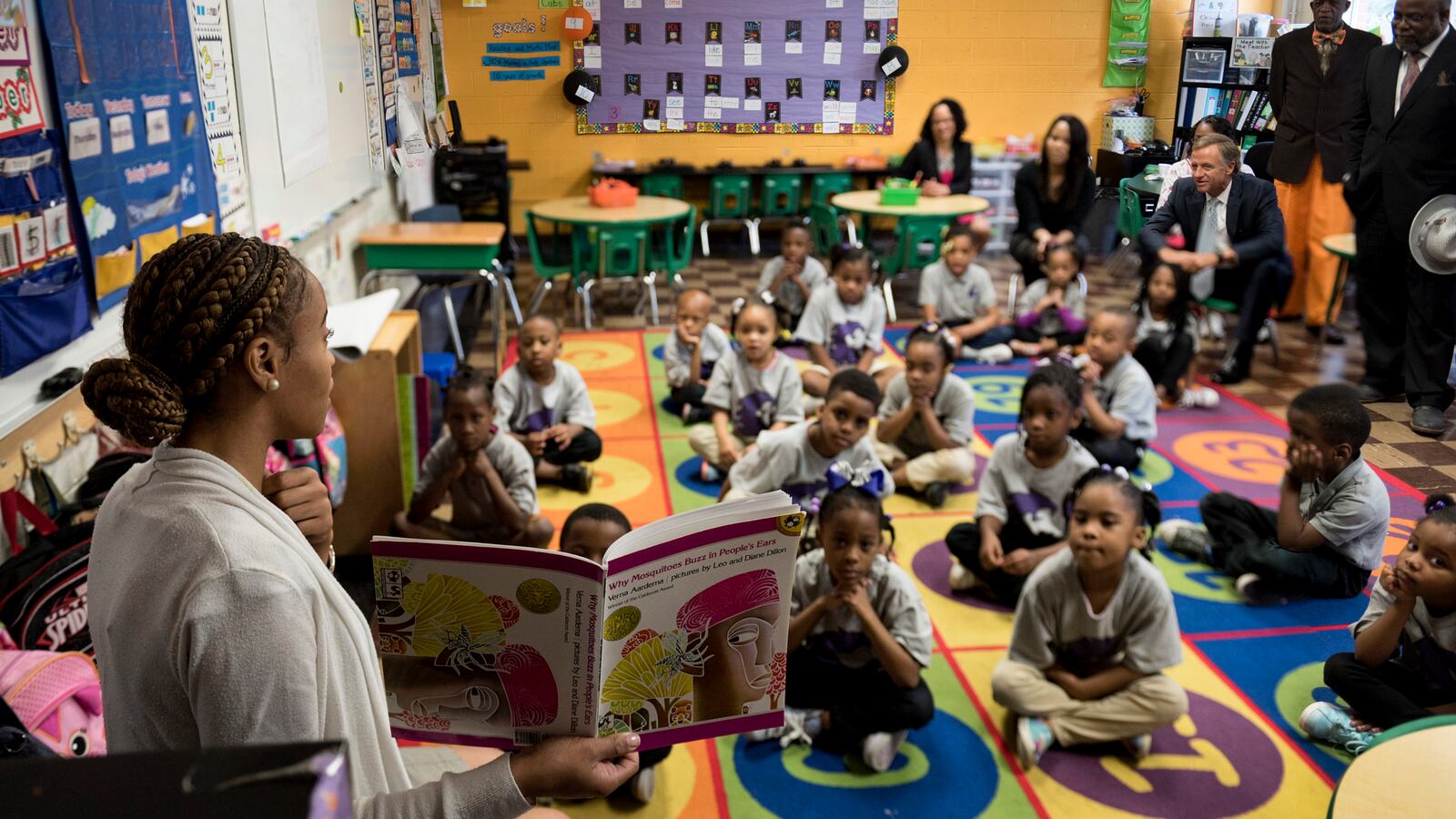 A teacher instructs students at Aspire Coleman Elementary School on May 12 as Gov. Bill Haslam and other officials visit the Memphis charter school operated under Tennessee's Achievement School District.