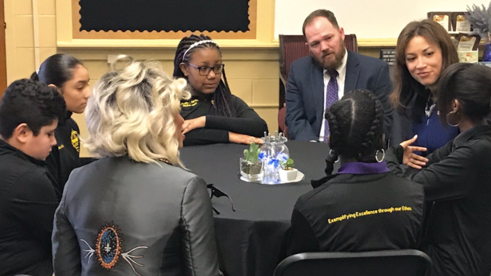 Tennessee Education Commissioner Penny Schwinn (right) speaks with students during a visit to LEAD Neely's Bend, a state-run charter school in Nashville. (Photo courtesy of LEAD Public Schools)