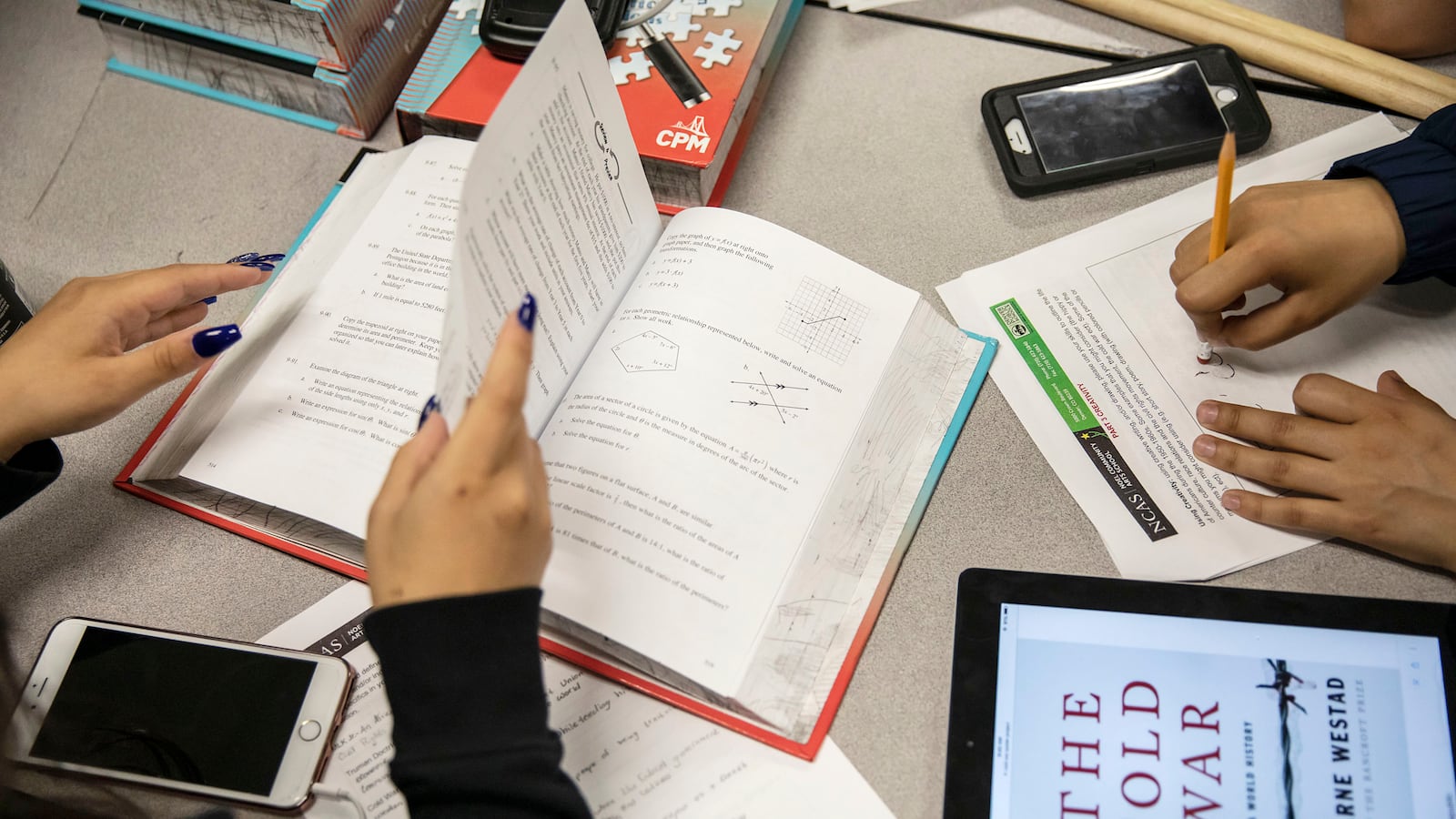 Noel Community Arts School students work through assigned classwork during a study period at the Denver school in May 2019.