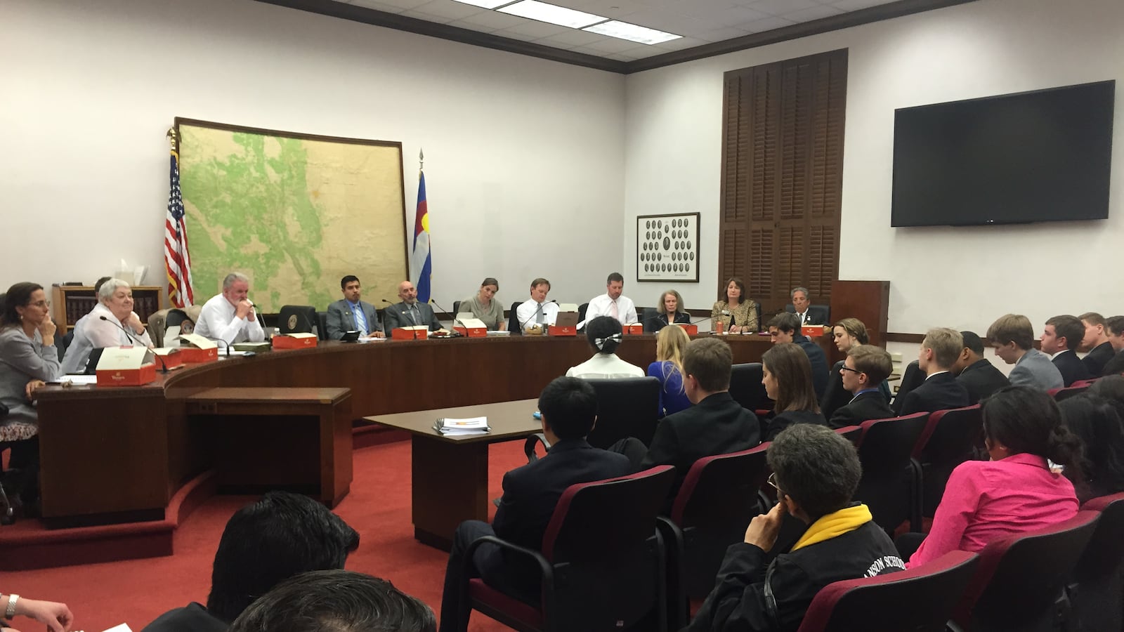 Students presenting to state representatives as part of the Colorado Youth Advisory Council.