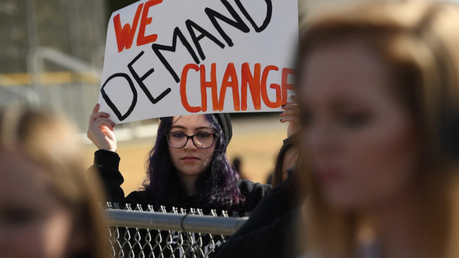 A student at Columbine High School holds a sign during a protest of gun violence, on March 14, 2018 in Littleton, Colorado.