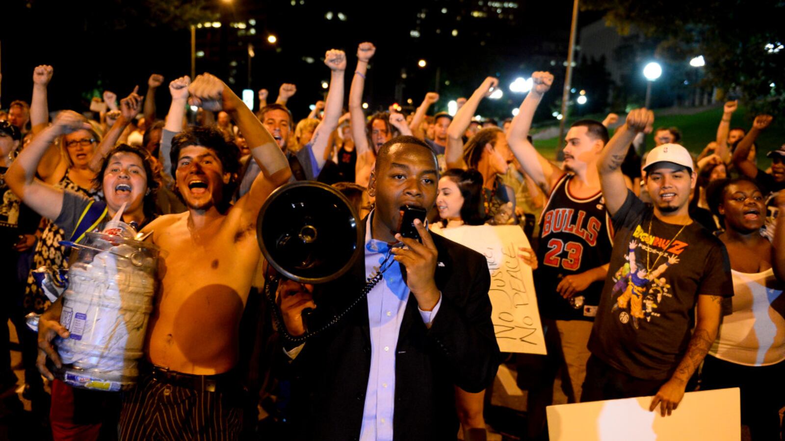 Tay Anderson leads a chant of "Black lives matter!" with a crowd of protestors in July 2016.